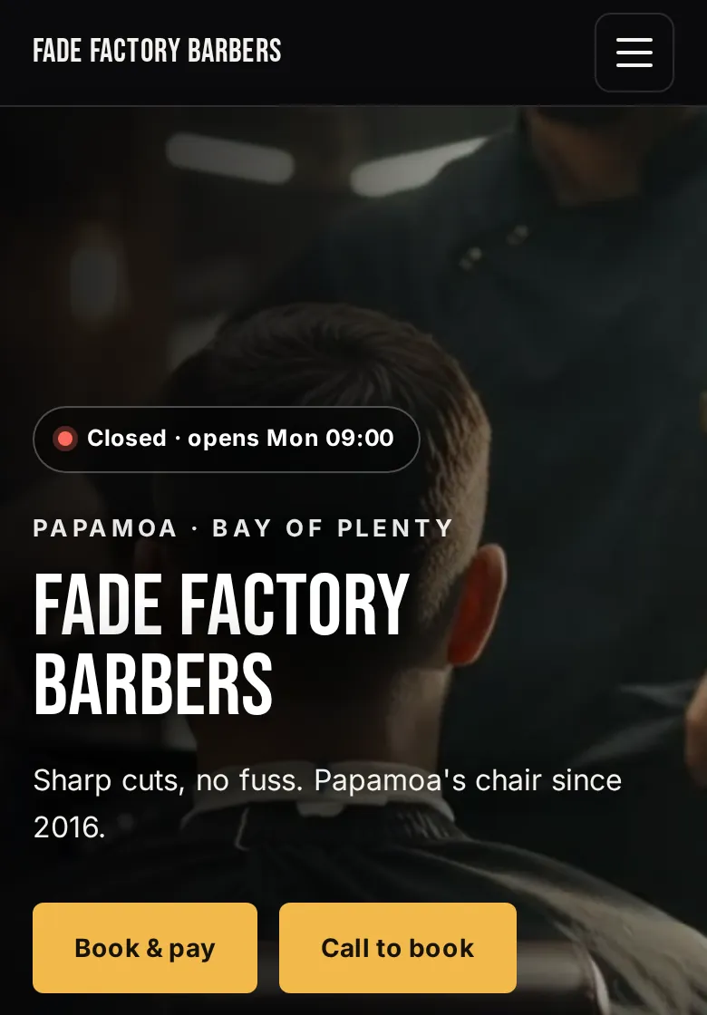 Classic style barbershop website on a phone: dark header, condensed white shop name and gold buttons